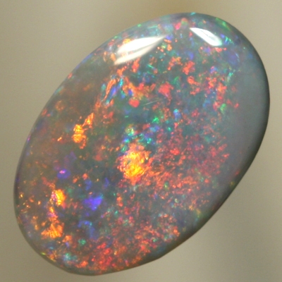 SOLID SEMI BLACK OPAL Sparkles of red/orange over green/blue
